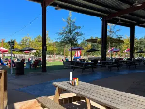 The Backyard with Neighbors Brew & Pies and Saw's BBQ Leeds