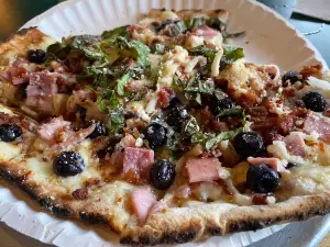 Cooking Carberrys wood Fired Pizza