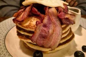 6 Stack of Pancakes with Bacon Fried Egg and Maple Syrup