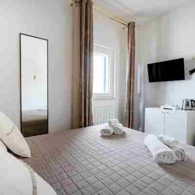 Terra | 2-Bedroom with Shared Kitchen & Balcony – Seafront Location Rooms