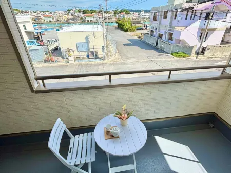 ZZOKIAI Orange Sunglow!Only 30 seconds walk to seaside!Maximun 10 perple! Отели рядом с достопримечательностью «Bibi Beach Itoman»