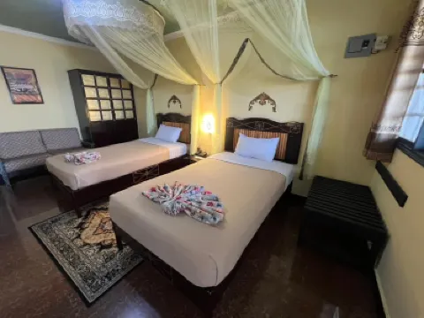 銹石海灘度假村及水療中心(Rusty Rock Beach Resort & spa) 酒店