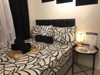 InMer's D Staycation Hotels near سمارت أرانيتا كوليسيوم