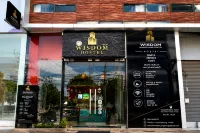 Wisdom Muangthong Hostel - Hostales