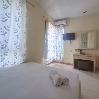 Tamastu Hotel Fortuna Jatiwaringin Hoteles cerca de Istana Singgah Kedatun Keagungan di Jati Bening