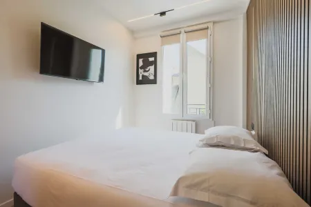 Charming Appt - 1BDR/4P - Saint Ouen Отели рядом с достопримечательностью «Alstom»