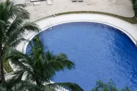 Spacious 2BR Azure Condo w/ Console & Karaoke - Beach