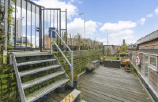 HouseBoat next to AMSTEL