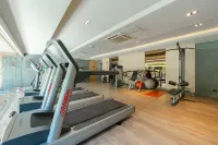 Baan Mai Khao, Luxury Beachfront Duplex 2 BR Residence - 健身室/gym room
