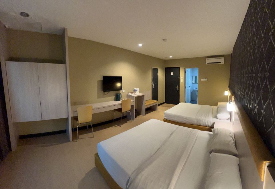 하보나 호텔의 깔끔하고 모던한 객실 내부 이미지