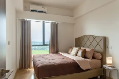 Calma 2BR II @Skyhouse Apartment Hotels near PMC Telaga Mekarwangi