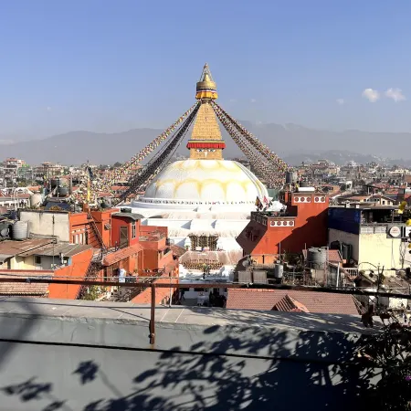 Warm Pink Rooftop apartment with Boudha View