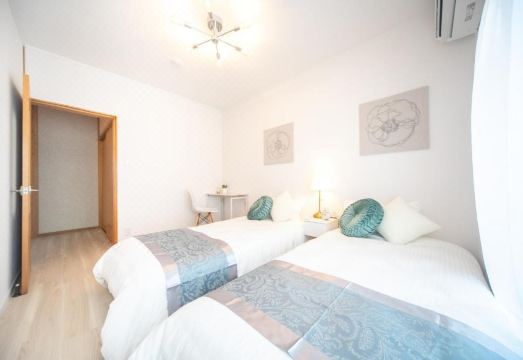 Nagashima Riverside Resort 6의 아늑한 침실