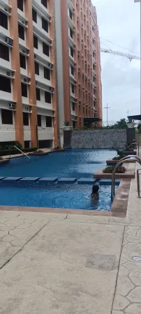 Condotel near NAIA Отели рядом с достопримечательностью «University of Perpetual Help System DALTA, Las Piñas Campus»