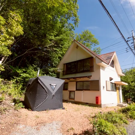 A private cottage in the forest, limited to one group per day — undo