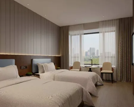 湘粵商務飯店XIANGYUE(瓦岱機場三江商貿城店&提前約免費接送機) 萬象酒店