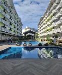 Condo Azur Suites Amani A125, near Airport, Netflix, Cozy with Luxurious Pool and Gym - Infinity Pools