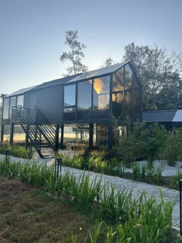 The AAM Glass Chalet by Smart Innlux