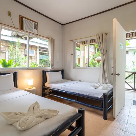 The Shark's Tail Dive Resort Hotels in Logon