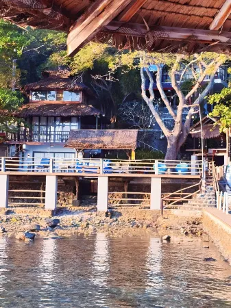 Vida Pacifica Resort & Hotel by RedDoorz Отели рядом с достопримечательностью «Aiyanar Beach and Dive Resort»