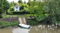 chalet paradisiaque en bord de Marne Hôtels à : Nanteuil-lès-Meaux