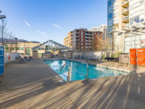 Coquitlam Center Bright & Modern 1BR Parking included Steps to SkyTrain | Pool & Gym Hotels in Coquitlam