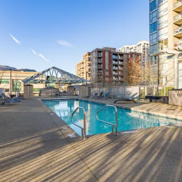 Coquitlam Center Bright & Modern 1BR Parking included Steps to SkyTrain | Pool & Gym