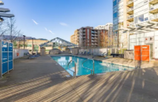 Coquitlam Center Bright & Modern 1BR Parking included Steps to SkyTrain | Pool & Gym