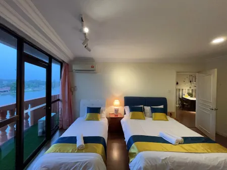 Nicely Riverbank suites 405 @Riverview Отели рядом с достопримечательностью «Sarawak Orchid Garden»