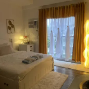 Amani by Hernz l With Balcony l Pool View l Rentals l Staycations l Airport