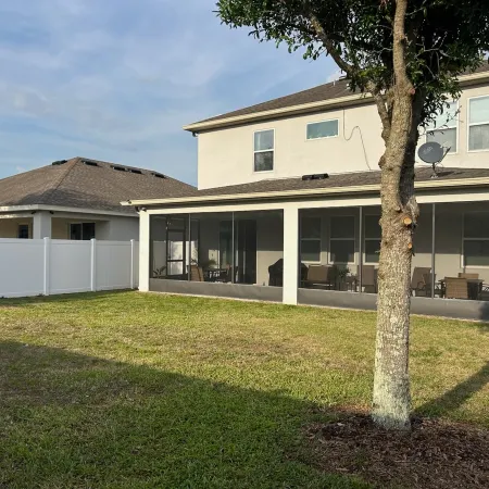 Cozy 4-bedroom house in Davenport- Haines City with WiFi, AC, Game Room, Screened Lanai