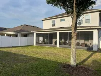 Cozy 4-bedroom house in Davenport- Haines City with WiFi, AC, Game Room, Screened Lanai - WiFi