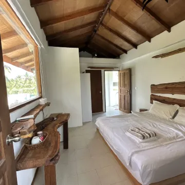 Aqua Oasis Hotels near Thoddu Beach