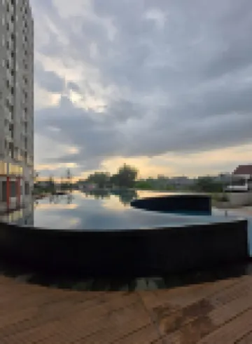 Apartemen amazana cheapest,cozy with wifi,pool and gym by luckystay
