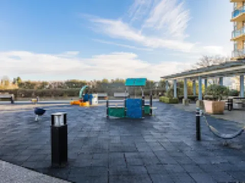 Coquitlam Center Bright & Modern 1BR Parking included Steps to SkyTrain | Pool & Gym Hotels in Coquitlam