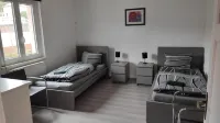Monteurwohnung bei Würzburg bis 10 Pers.mit  fünf Schlafzimmer incl. Parkplatz und WLAN + Grill - Homestays
