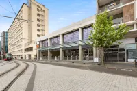 Central stylish 1 bedroom with balcony and air-con