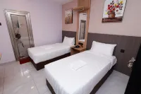 Hotel Mawar Inn Hoteles en Tanjung Dua Belas