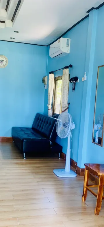 Villa 1 ห้องนอน 3 เตียง ห้องนั่งเล่น และห้องครัว