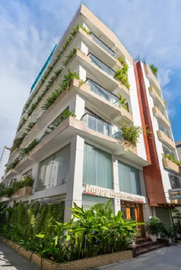 Happy House Hotel & Apartment Отели рядом с достопримечательностью «My Khe Pagoda»
