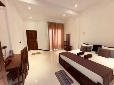 Asai surf inn Arugambay Отели в г. 