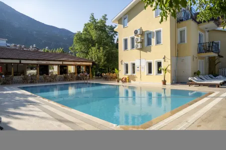 Gunes Boutique Hotel - Oludeniz Отели в г. Oludeniz Mahallesi