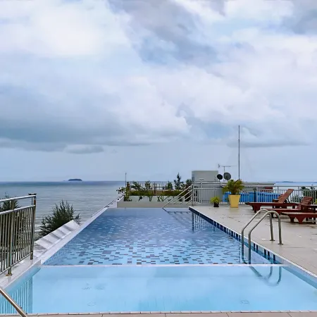Mae Phim Beachside 1BR Condo | Rooftop Sea View Pool