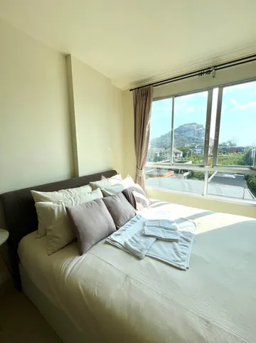 รูปภาพของคอนโดหรูใกล้ชายหาด · สระว่ายน้ำและฟิตเนส · วิวสวย