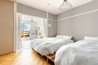 [Near USJ] For group trips! Roomy 4-story building with projector terrace near the station [for 12] - Huvilat