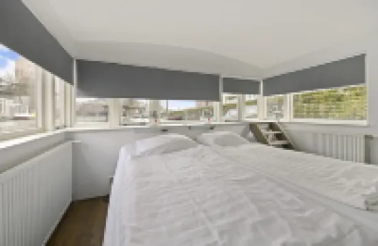 HouseBoat next to AMSTEL