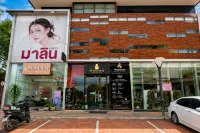 Wisdom Muangthong Hostel - Hostales