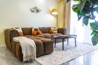 Chic Loft steps from Yaya Center | Pool + gym
