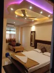 Galaxy Executive Lodging Hotels near ISKCON NVCC Temple