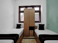 OYO 95035 Harmony Guest House Syariah Sawojajar Hôtels à : Pakis
